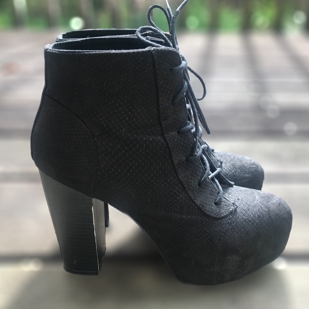 Black lace up high heel boots